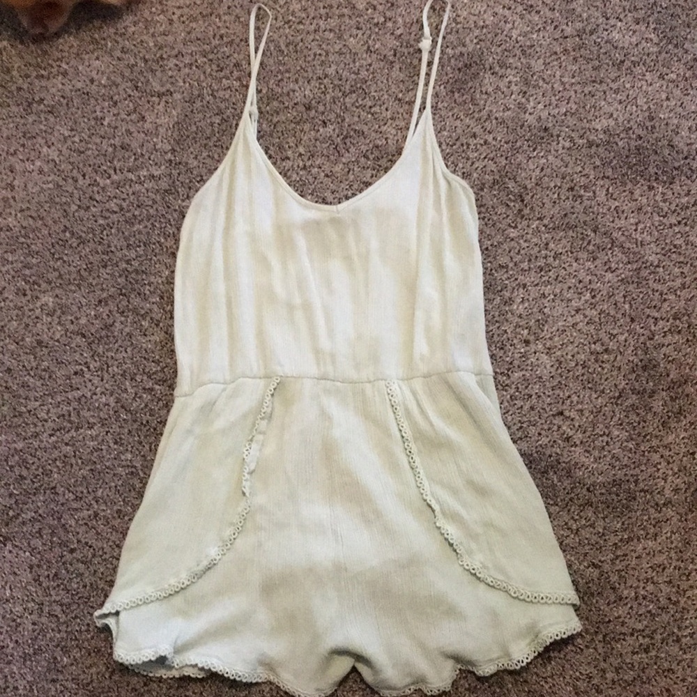 Green Foreign Exchange romper. Small.